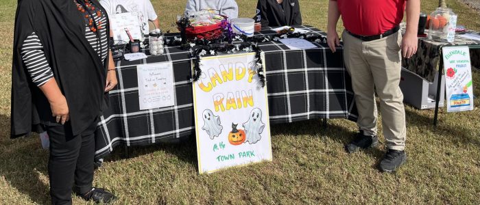 Jay and Terrie and sign in table Candy Rain 2025